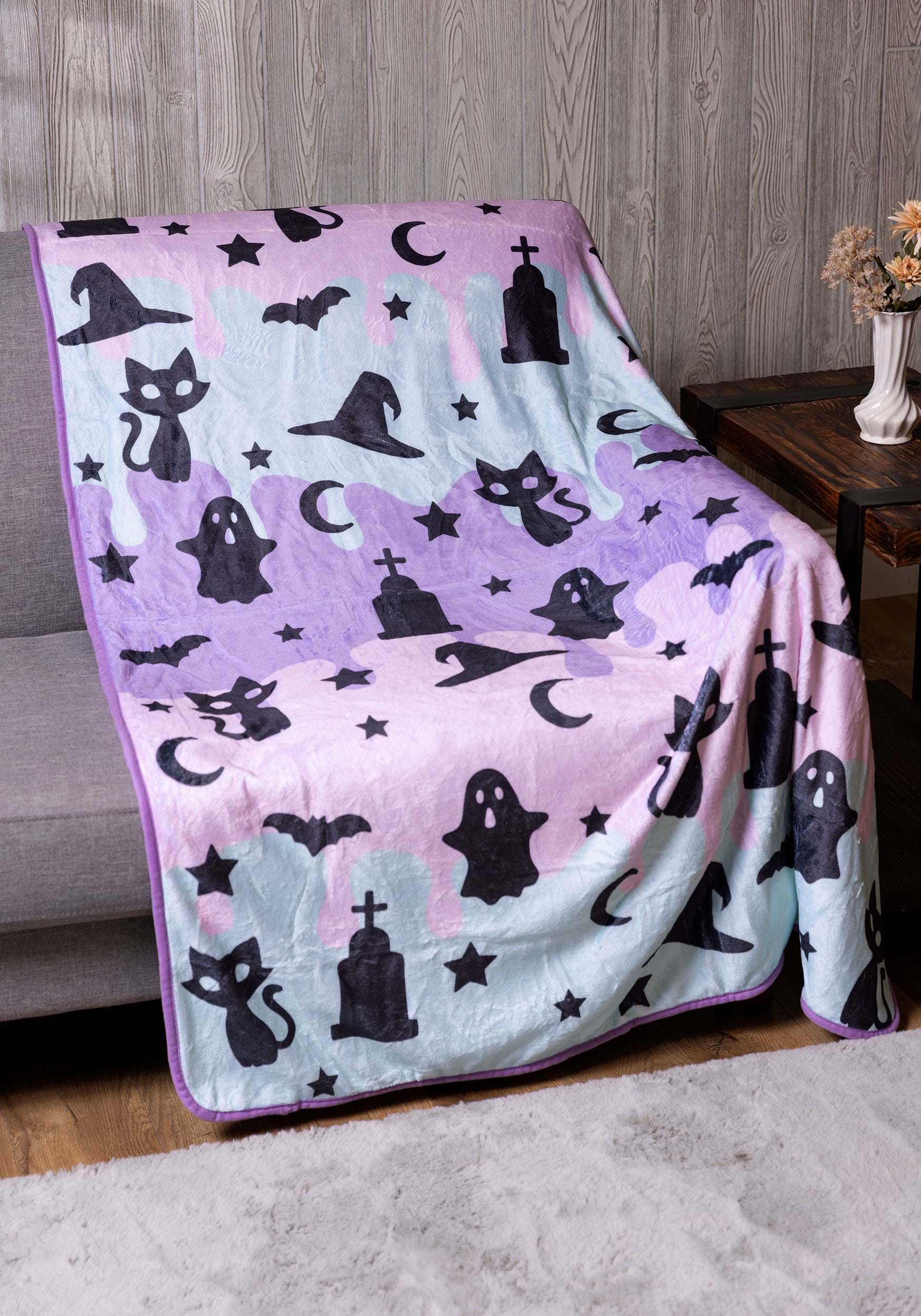 https://images.halloween.com/products/87782/1-1/pastel-halloween-throw-blanket.jpg